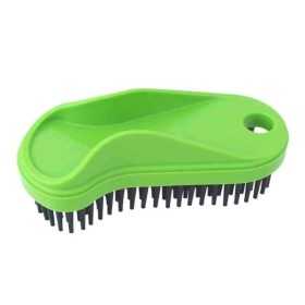 Brosse en caoutchouc pour nettoyer les poils d'animaux des tissus d'ameublement